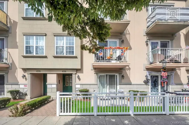 front view of a house with a small yard