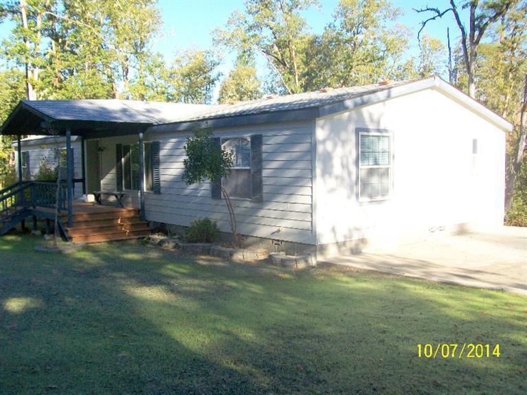898 Greenview Road Cave Junction, OR 97523 - Photo 3 of 23 a view of a house with backyard
