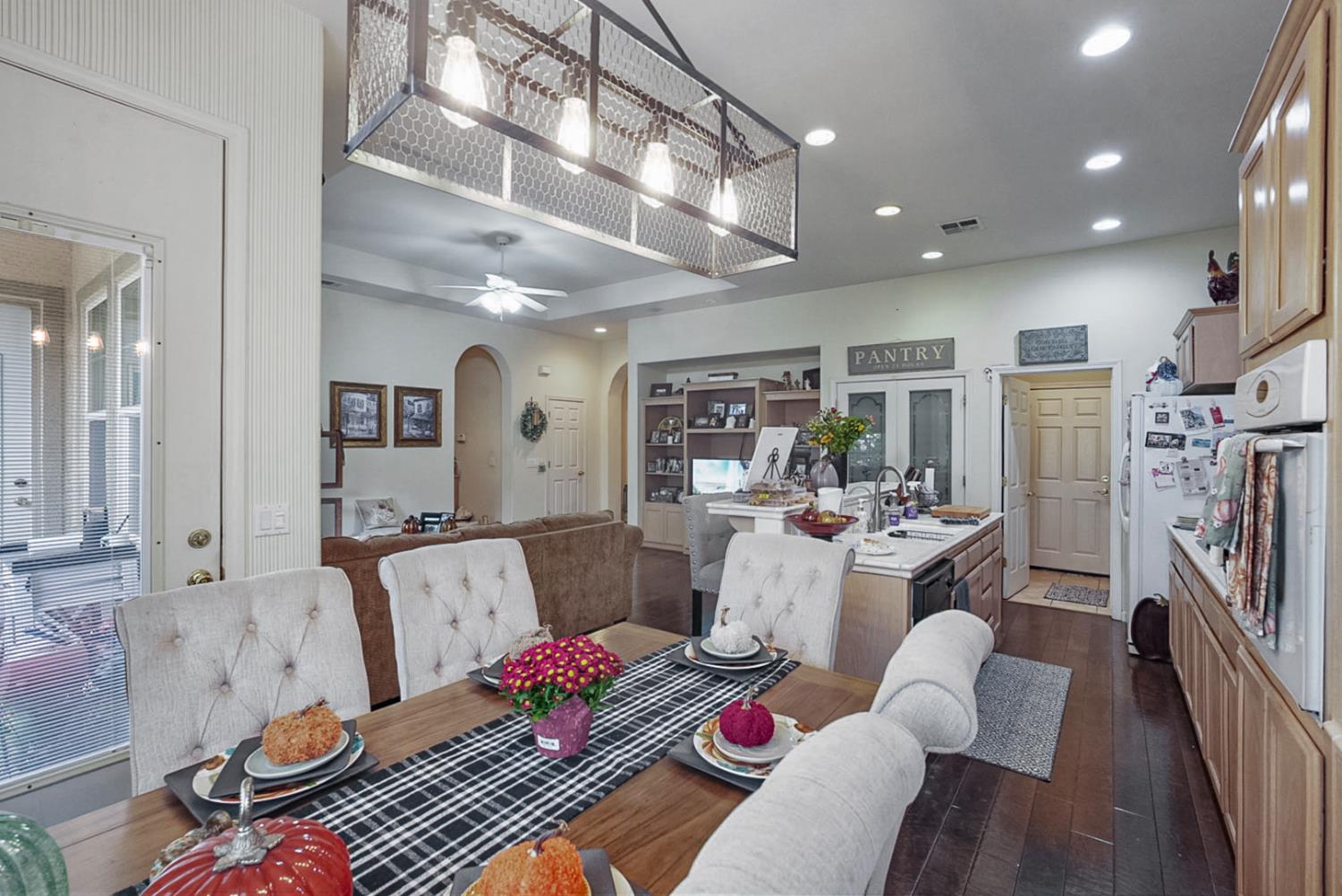 191 Fall Avenue Patterson, CA 95363 - Photo 17 of 31 a living room with furniture fireplace and a flat screen tv