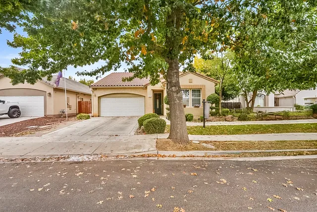 front view of a house with a street