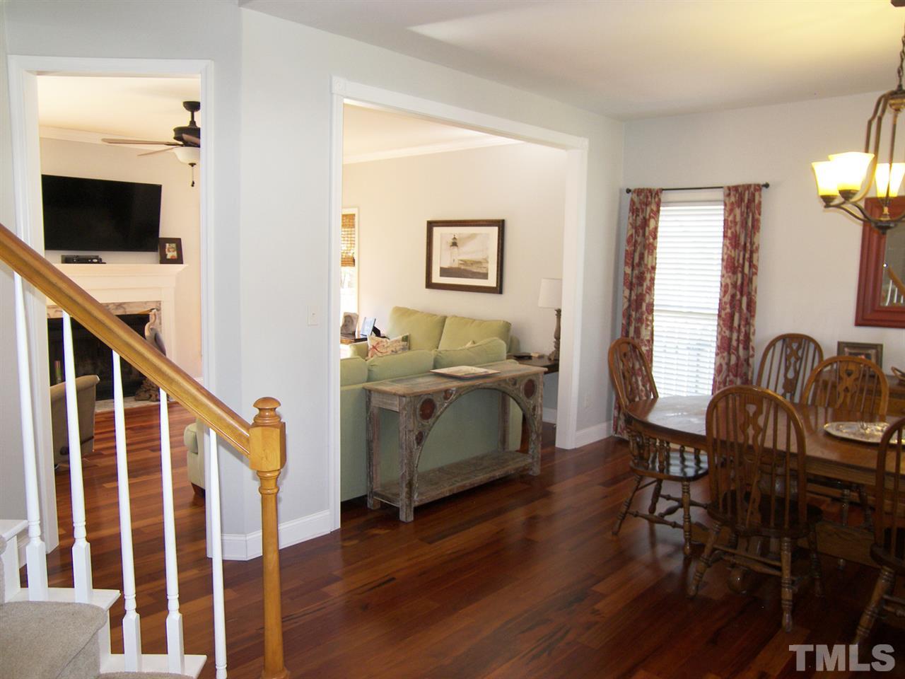 11933 Fairlie Place Raleigh, NC 27613 - Photo 25 of 25 a living room with furniture and a flat screen tv