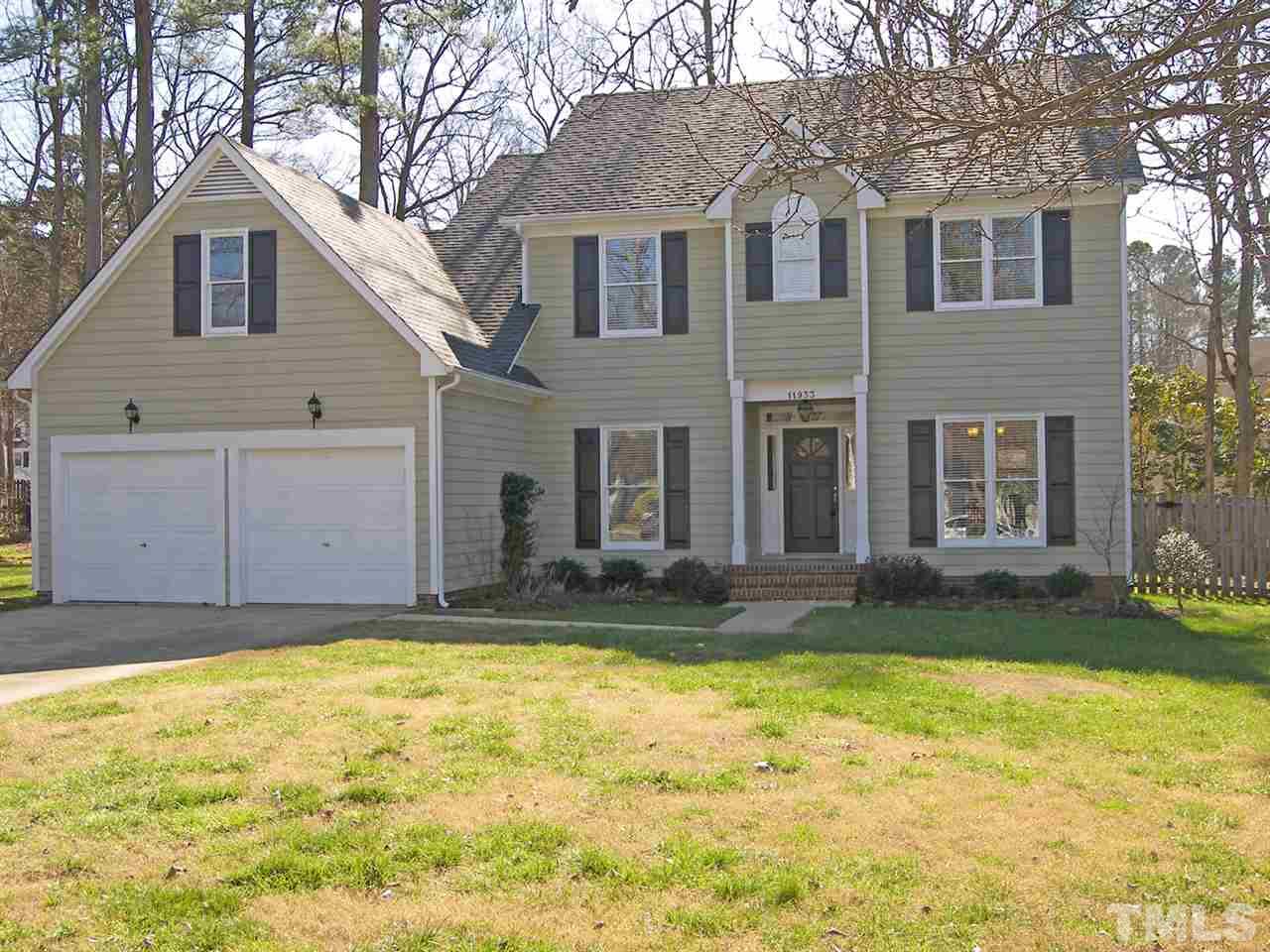 11933 Fairlie Place Raleigh, NC 27613 - Photo 23 of 25 a view of a house with a yard