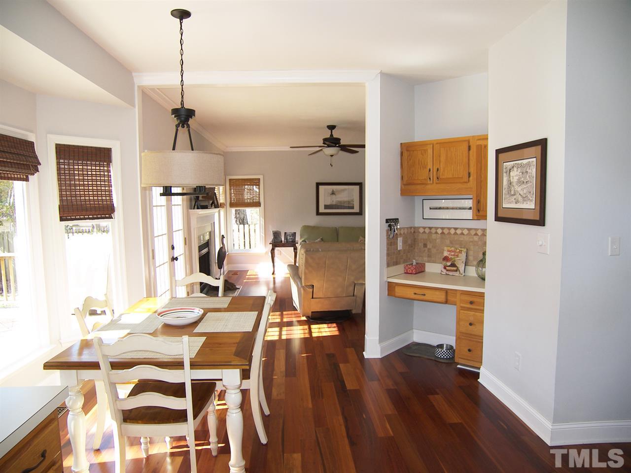 11933 Fairlie Place Raleigh, NC 27613 - Photo 7 of 25 a living room with furniture and wooden floor