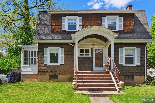 1149-1153 Loraine Avenue Plainfield, NJ 07062 - Photo 1 of 15 a view of a house with a small garden
