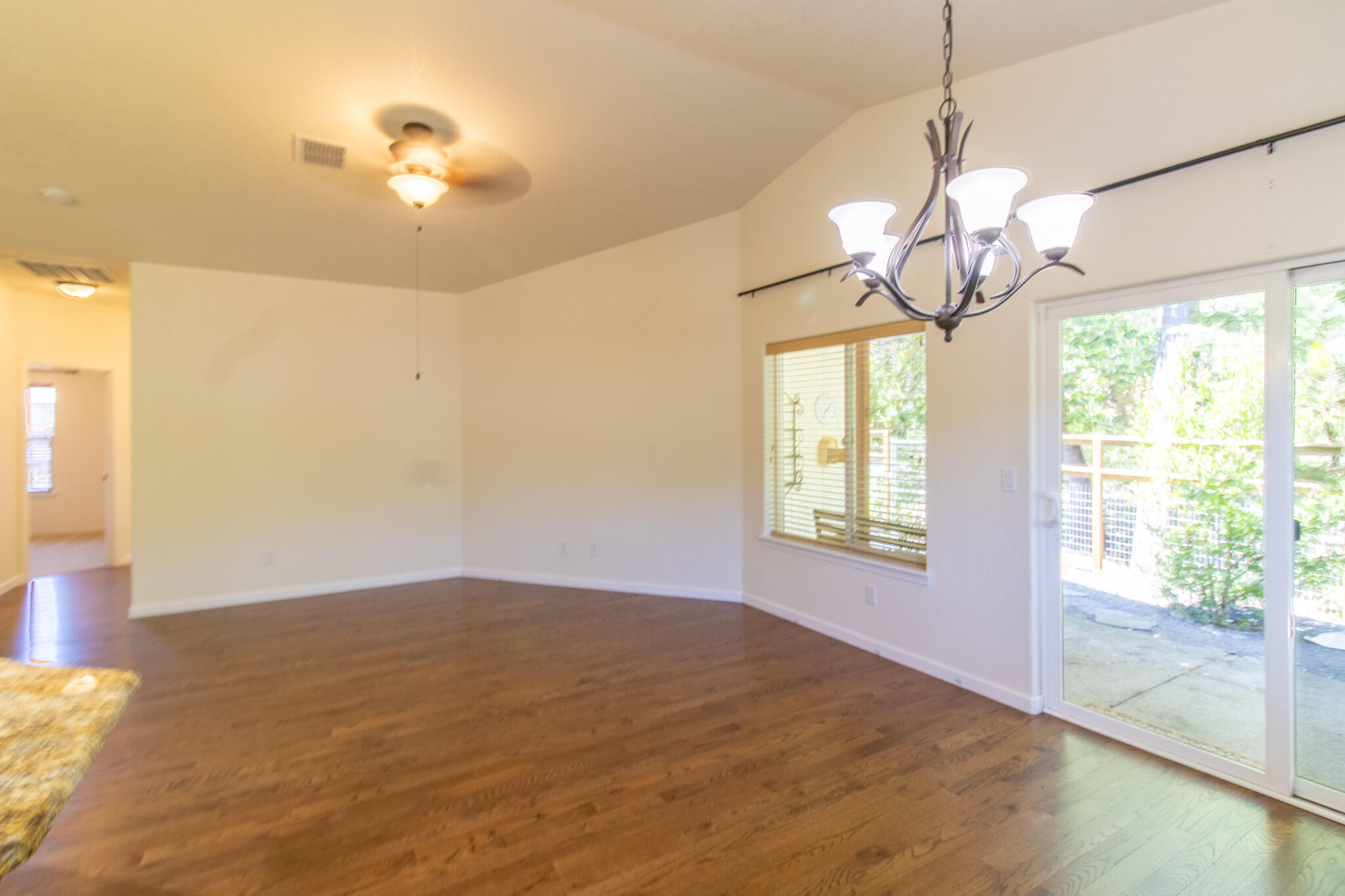 337 Cedar Ridge Drive Cave Junction, OR 97523 - Photo 11 of 56 a view of an empty room with a window