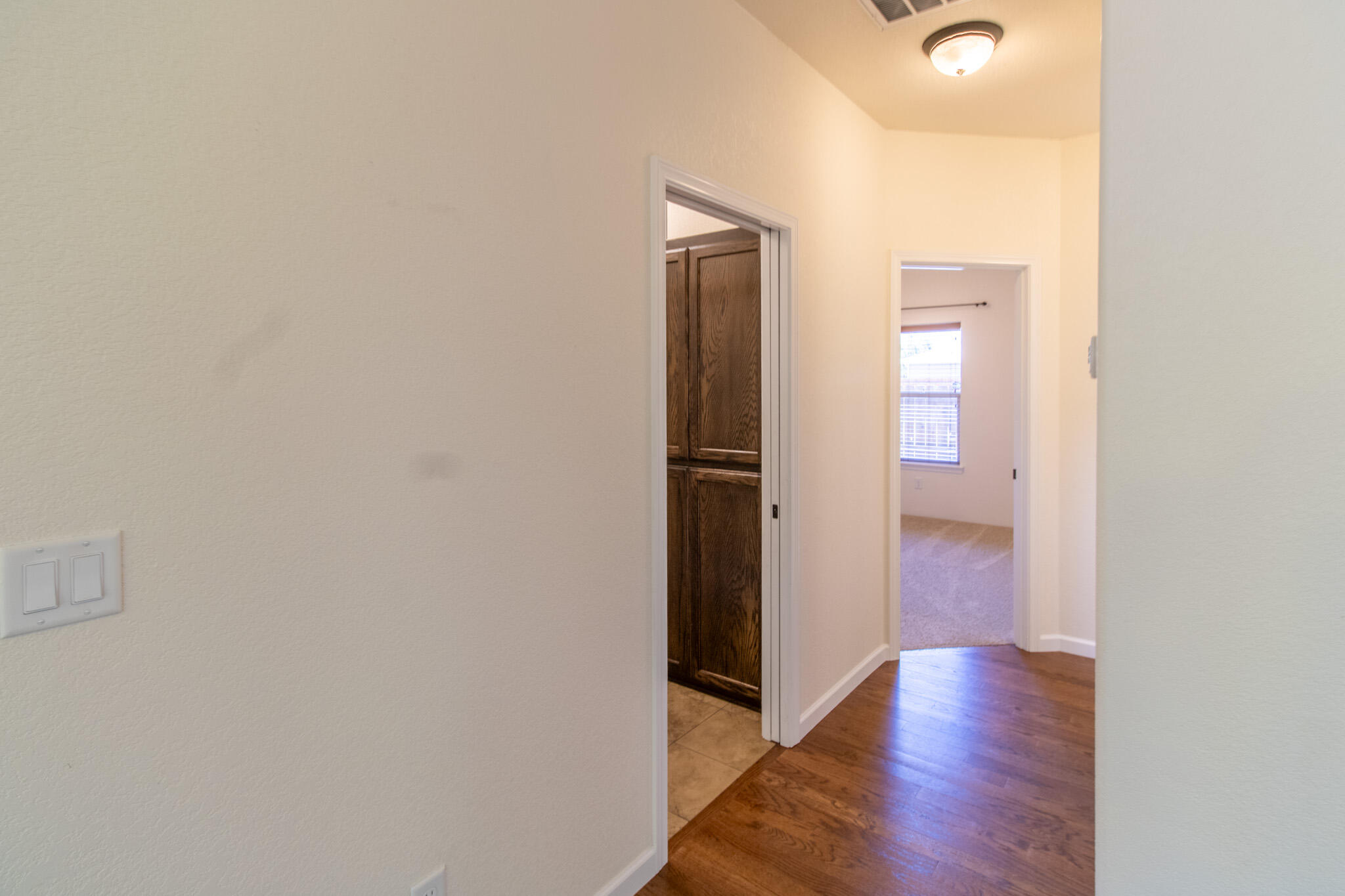 337 Cedar Ridge Drive Cave Junction, OR 97523 - Photo 20 of 56 a view of a hallway with wooden floor