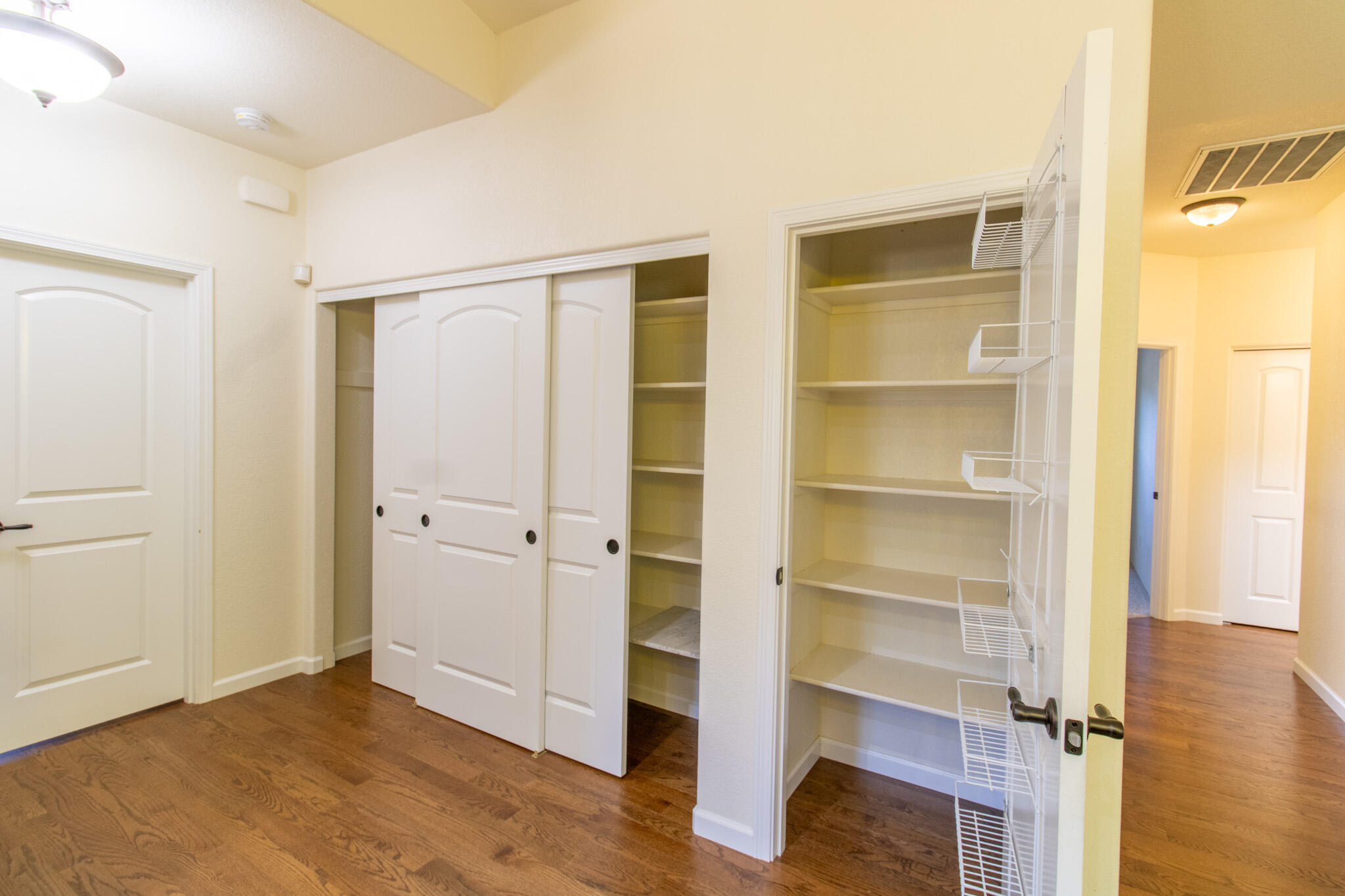 337 Cedar Ridge Drive Cave Junction, OR 97523 - Photo 35 of 56 a view of an empty room with wooden floor and closet