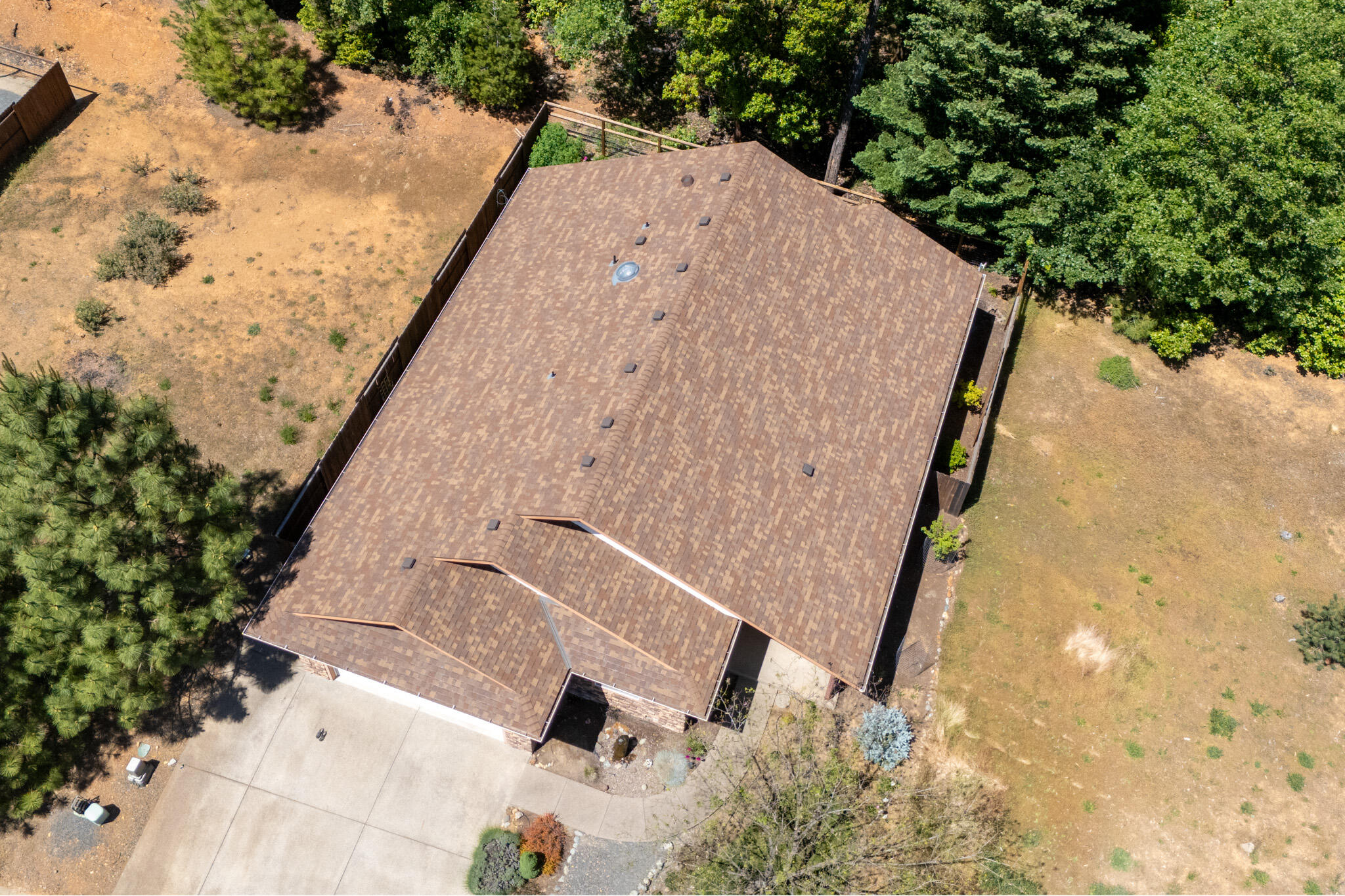 337 Cedar Ridge Drive Cave Junction, OR 97523 - Photo 4 of 56 an aerial view of a house with a yard