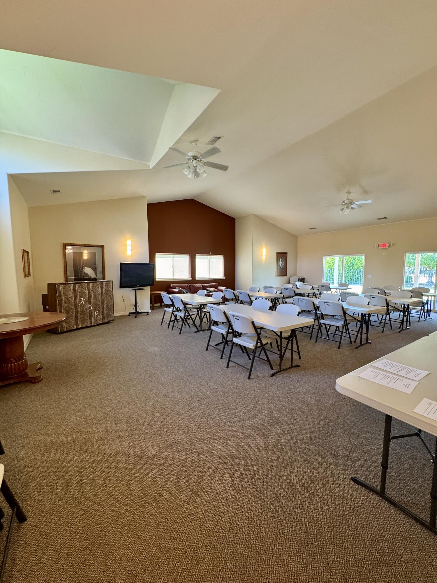 337 Cedar Ridge Drive Cave Junction, OR 97523 - Photo 46 of 56 a room with lots of chairs and mirrors