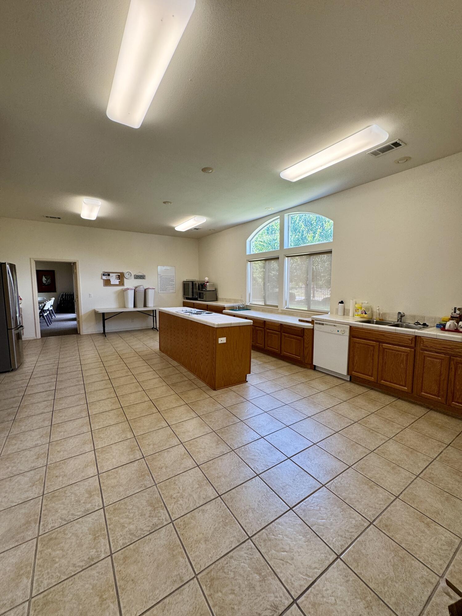 337 Cedar Ridge Drive Cave Junction, OR 97523 - Photo 50 of 56 a large kitchen with stainless steel appliances lots of counter top space