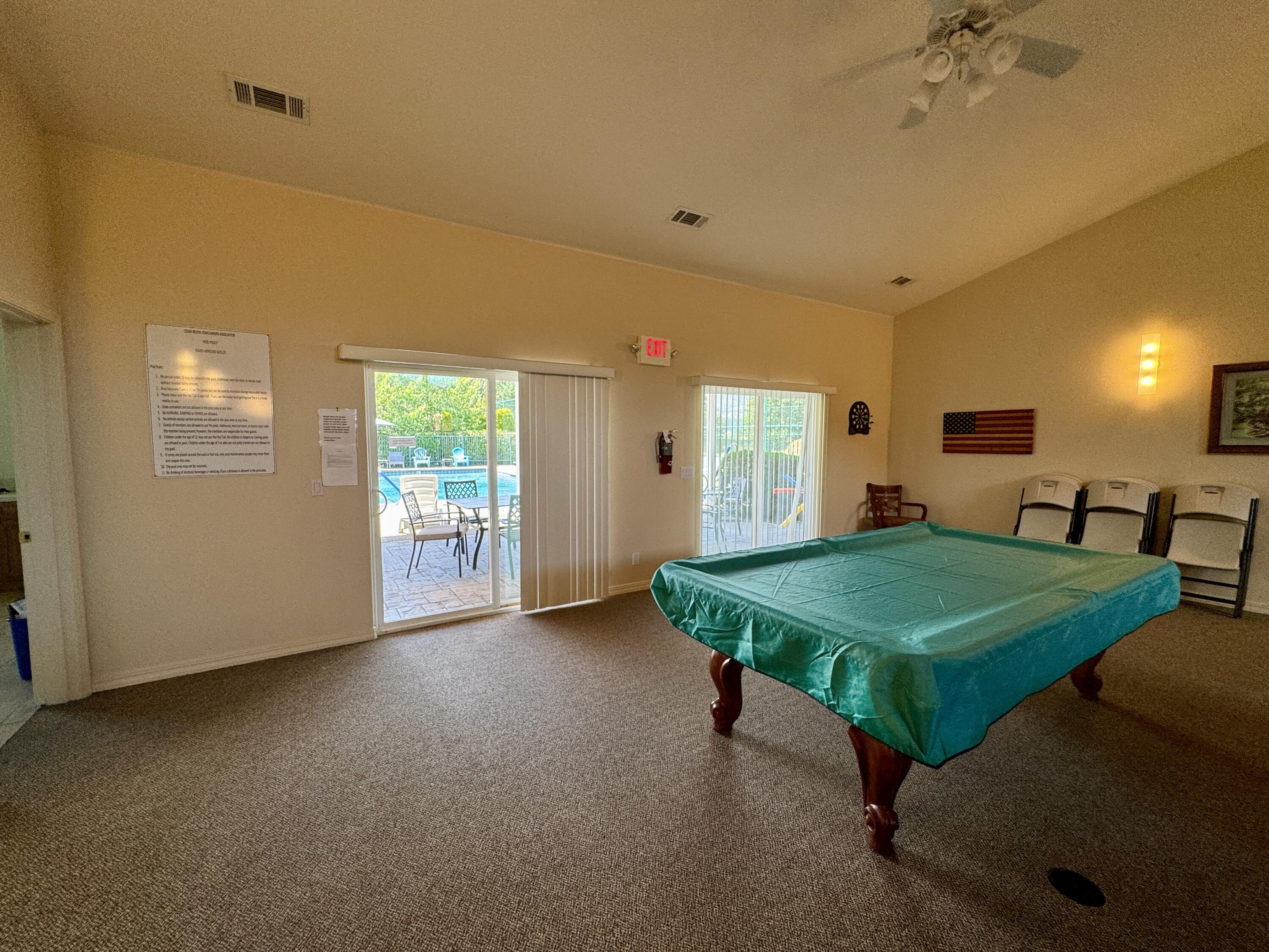 337 Cedar Ridge Drive Cave Junction, OR 97523 - Photo 53 of 56 a room with pool table and windows