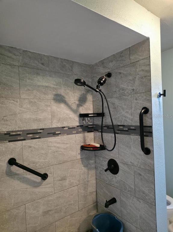 2111 North Keene Road Clearwater, FL 33763 - Photo 22 of 35 a bathroom with a shower