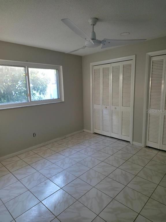 2111 North Keene Road Clearwater, FL 33763 - Photo 24 of 35 a view of an empty room and window