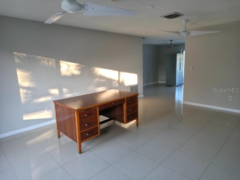 2111 North Keene Road Clearwater, FL 33763 - Photo 3 of 35 a room with furniture