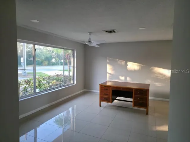 a view of room with furniture window and outside view