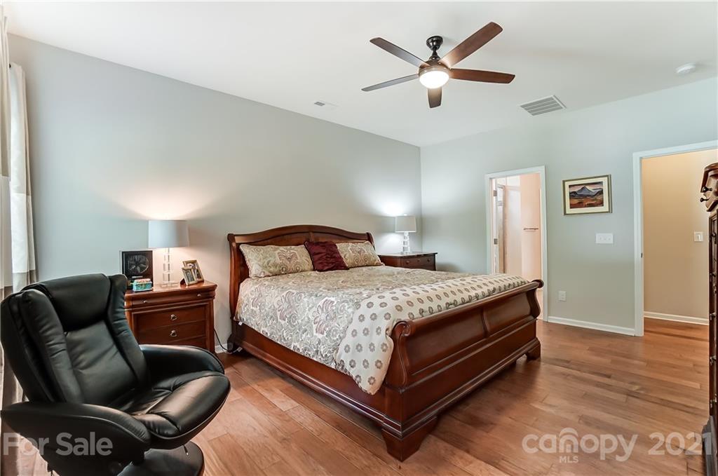 1765 Still River Way Fort Mill, SC 29708 - Photo 24 of 46 a bedroom with a bed couch and a window