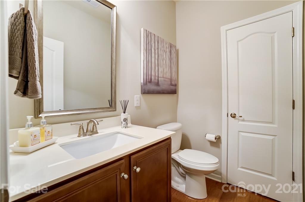 1765 Still River Way Fort Mill, SC 29708 - Photo 34 of 46 a bathroom with a sink a toilet and mirror