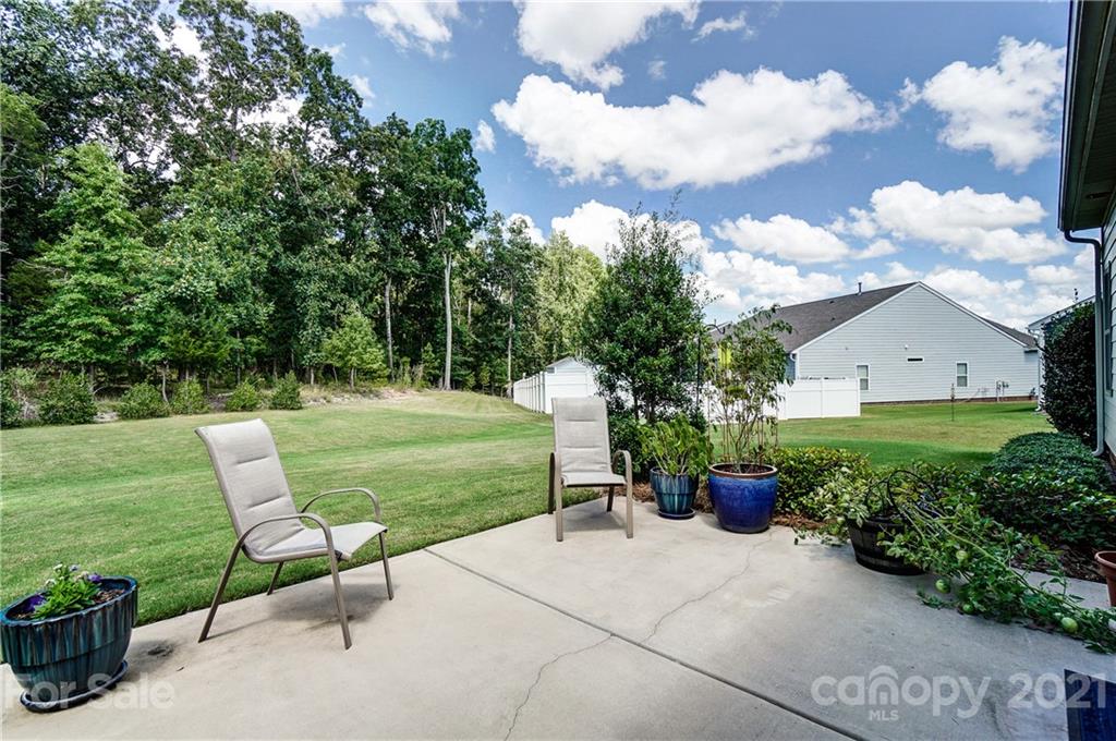 1765 Still River Way Fort Mill, SC 29708 - Photo 45 of 46 a view of a garden with sitting area