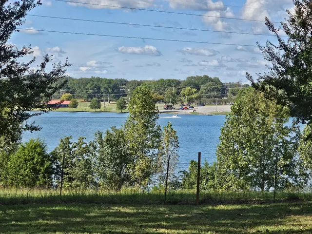 a kitchen with a cabinets and white appliances
