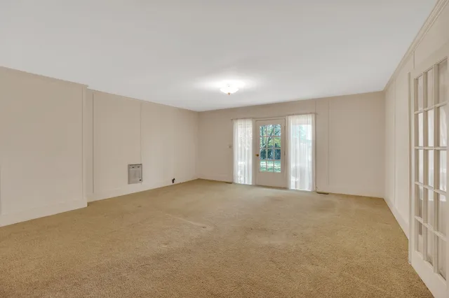 a bedroom with a bed and a closet