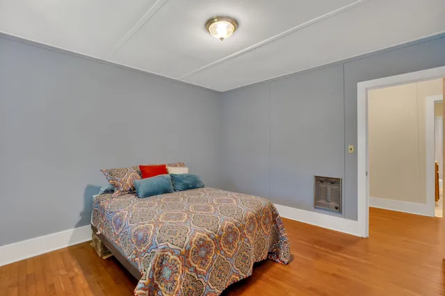a bathroom with a sink a mirror and a shower