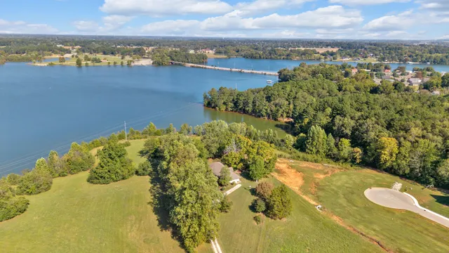 a view of a lake with a building in the background