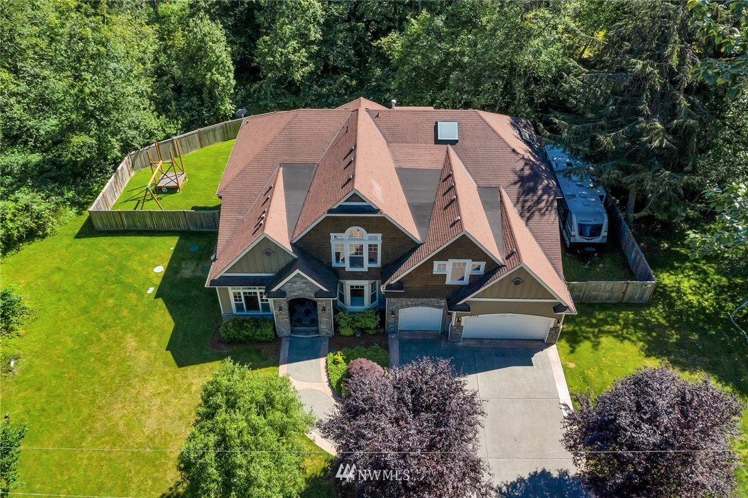17725 Southeast 123rd Place Renton, WA 98059 - Photo 1 of 37 a aerial view of a house with swimming pool and garden