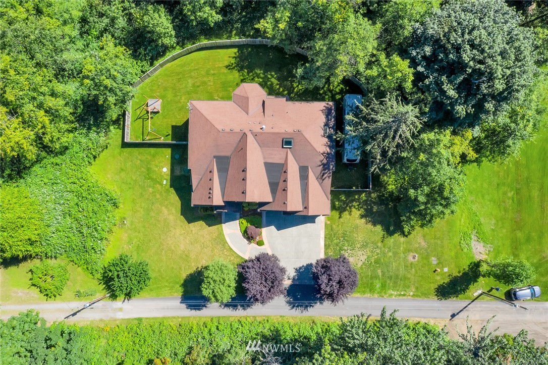 17725 Southeast 123rd Place Renton, WA 98059 - Photo 20 of 37 an aerial view of a house with a garden and swimming pool