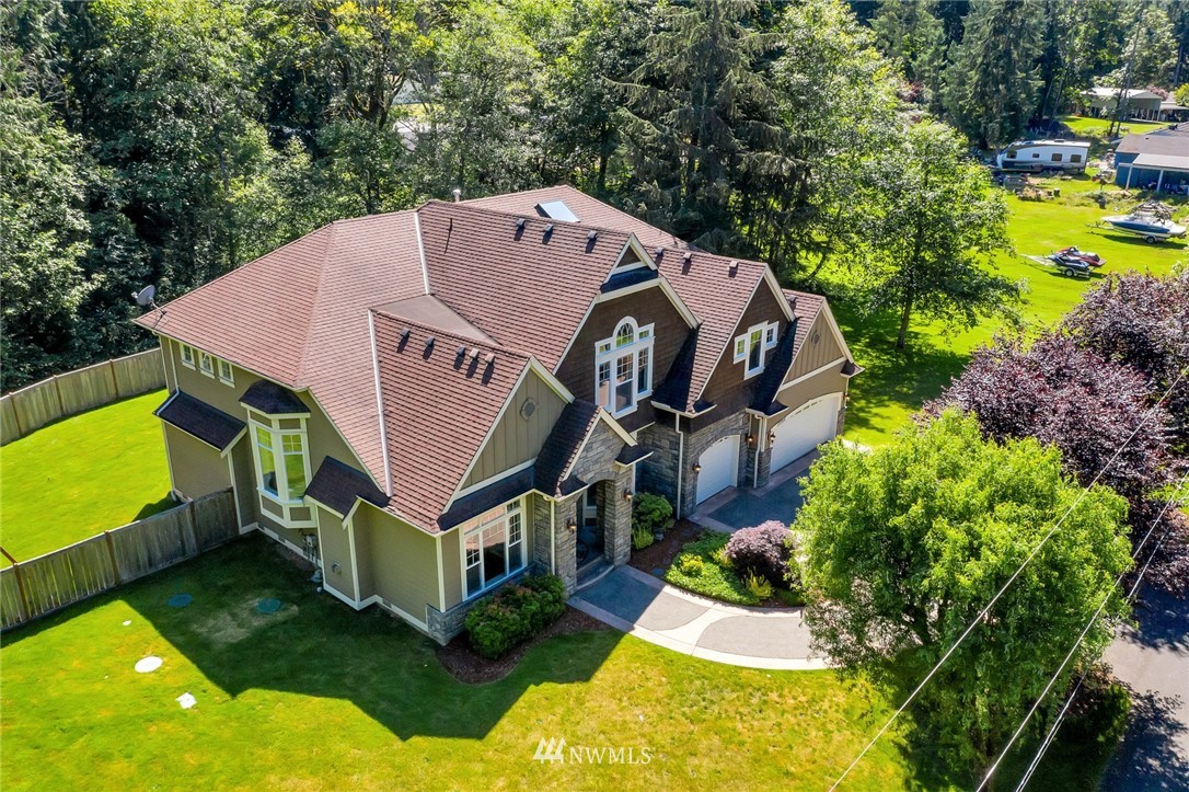 17725 Southeast 123rd Place Renton, WA 98059 - Photo 22 of 37 a aerial view of a house with swimming pool and large trees