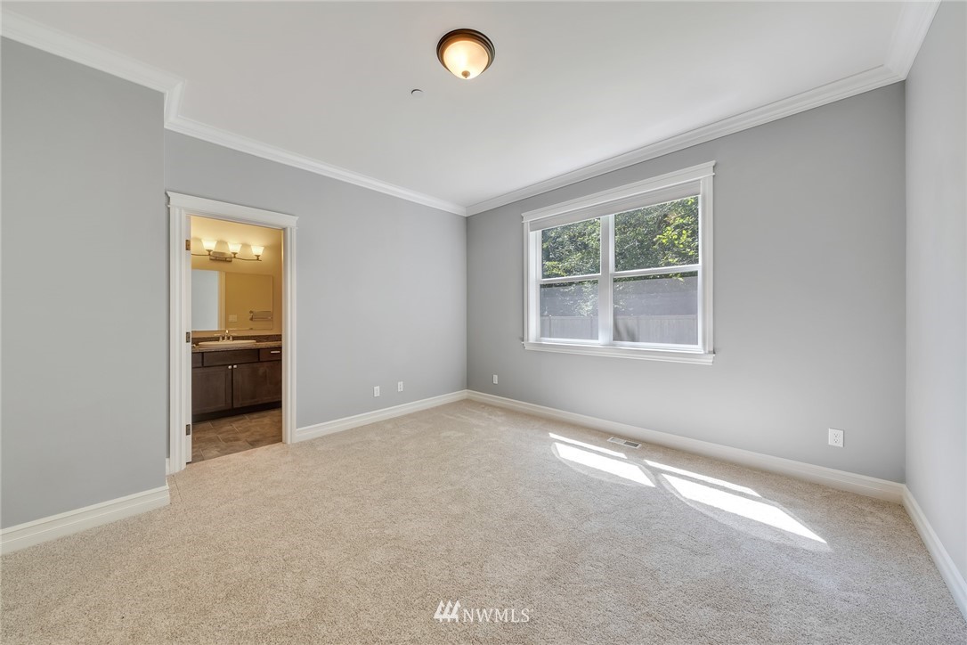 17725 Southeast 123rd Place Renton, WA 98059 - Photo 23 of 37 an empty room with windows and closet