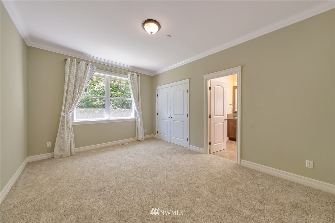 17725 Southeast 123rd Place Renton, WA 98059 - Photo 30 of 37 an empty room with windows and closet