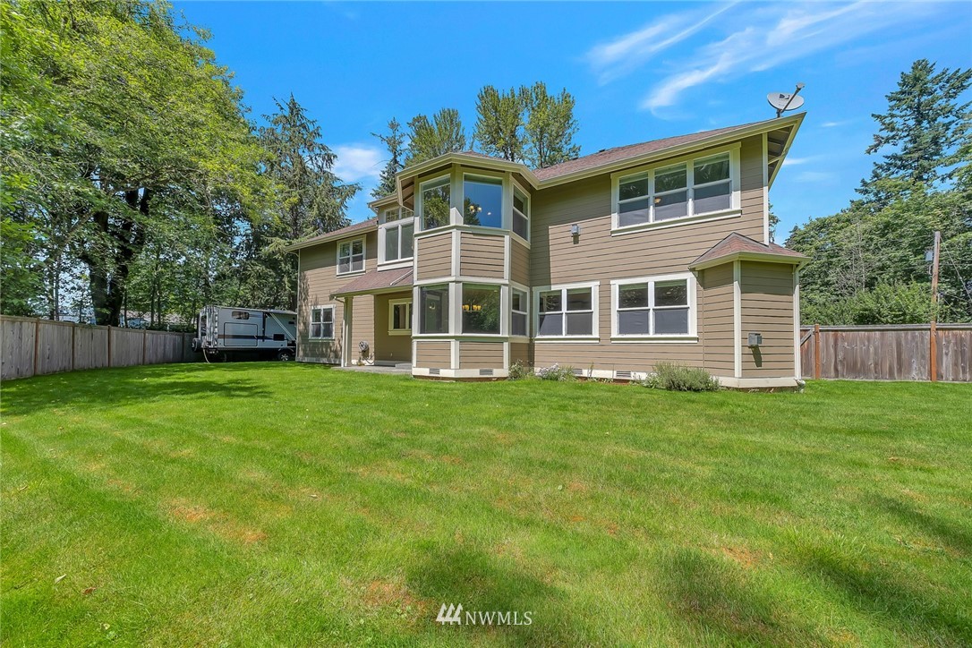 17725 Southeast 123rd Place Renton, WA 98059 - Photo 4 of 37 a front view of a house with a yard