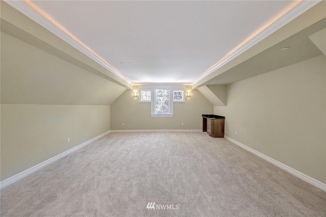 17725 Southeast 123rd Place Renton, WA 98059 - Photo 33 of 37 a view of an empty room with a window