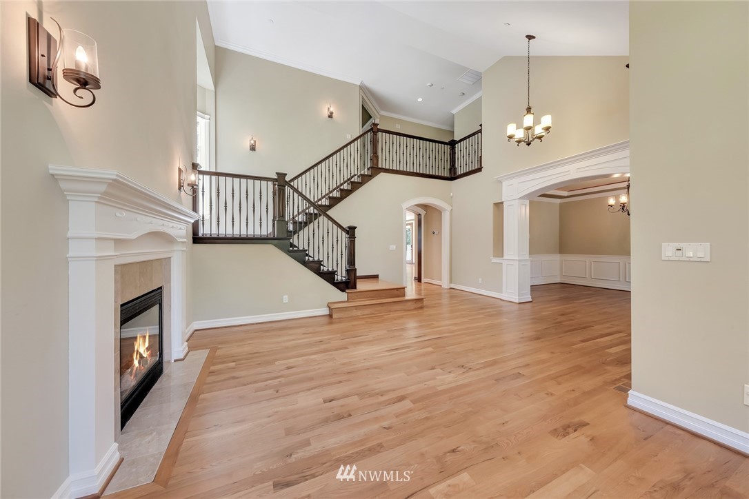 17725 Southeast 123rd Place Renton, WA 98059 - Photo 9 of 37 a view of entryway and hall with wooden floor
