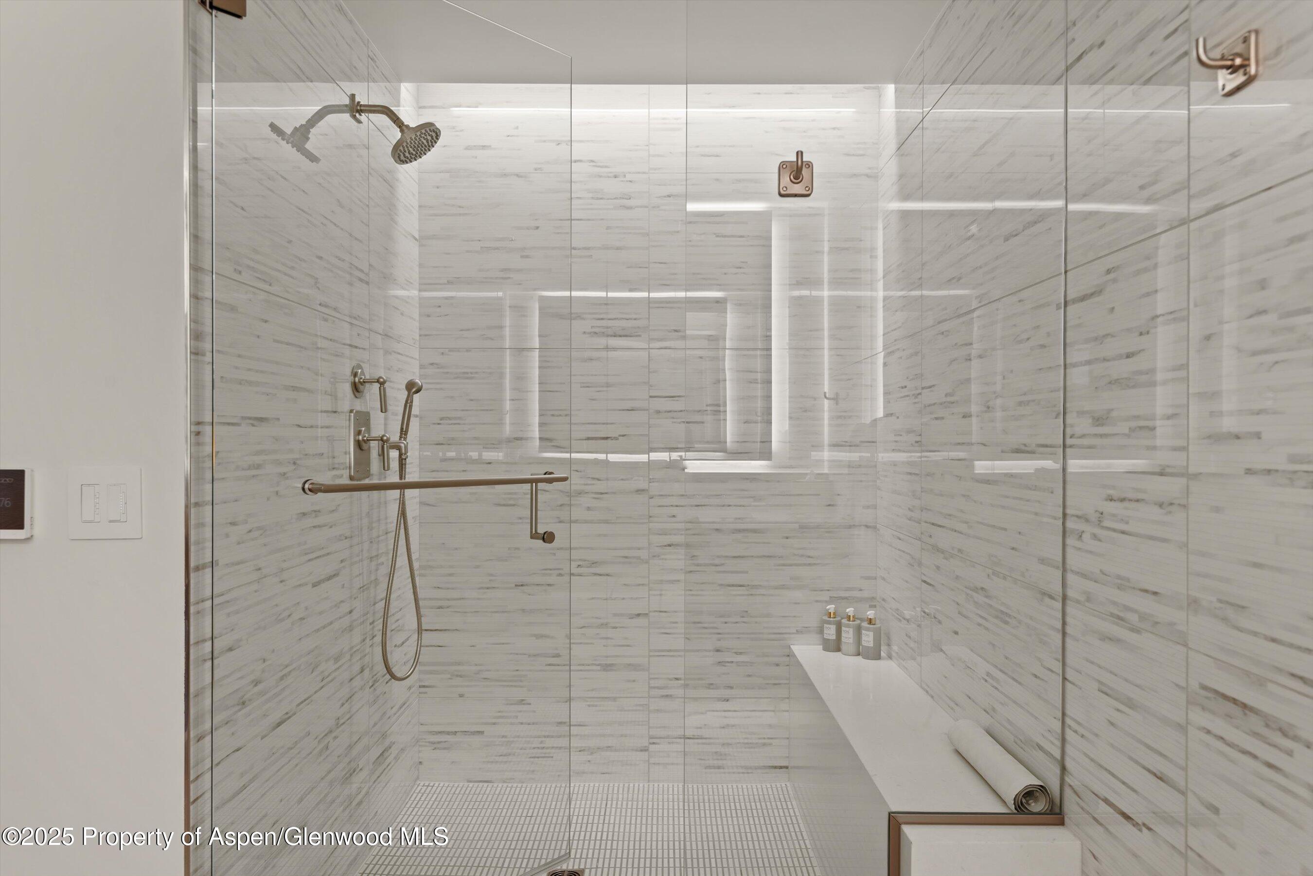 130 Wood Road, Unit 560562 Snowmass Village, CO 81615 - Photo 17 of 37 a bathroom with a shower