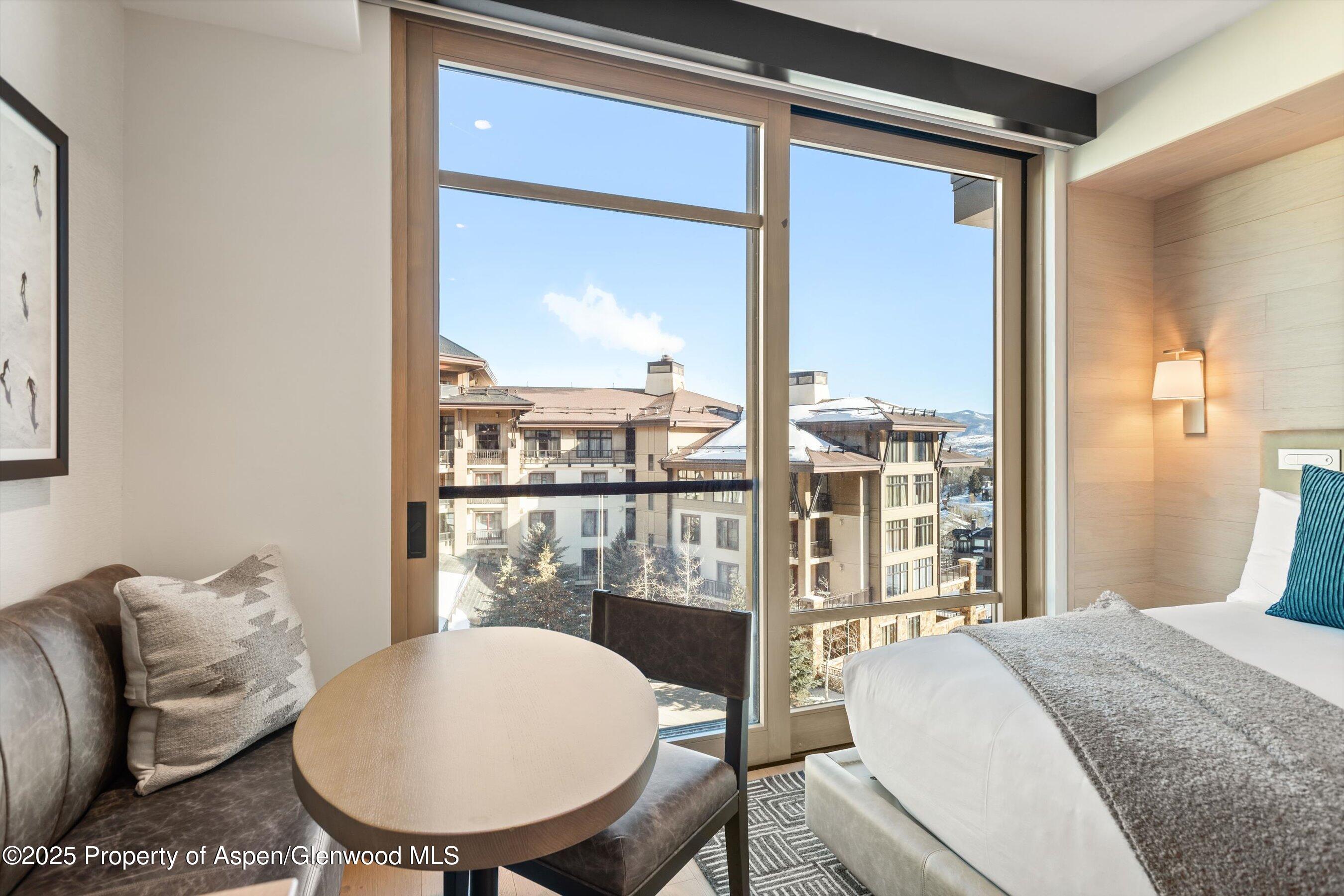 130 Wood Road, Unit 560562 Snowmass Village, CO 81615 - Photo 20 of 37 a living room with furniture