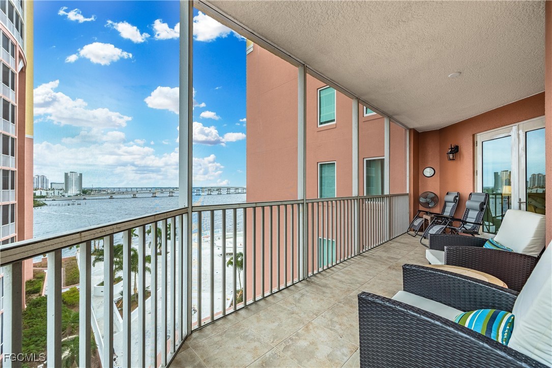 2745 First Street, Unit 705 Fort Myers, FL 33916 - Photo 27 of 49 a balcony with furniture and city view