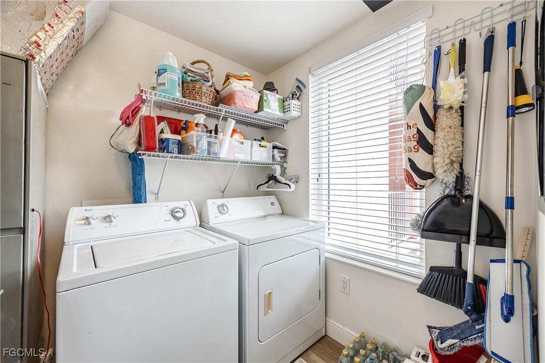 2745 First Street, Unit 705 Fort Myers, FL 33916 - Photo 30 of 49 a utility room with dryer and washer