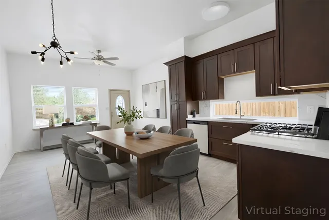 a view of a dining room with furniture
