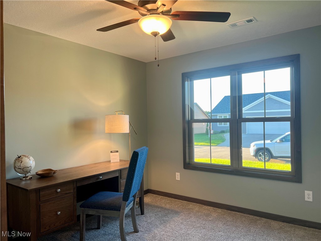 5531 Innkeeper Street Southeast Dennison, OH 44621 - Photo 22 of 30 Carpeted home office with ceiling fan