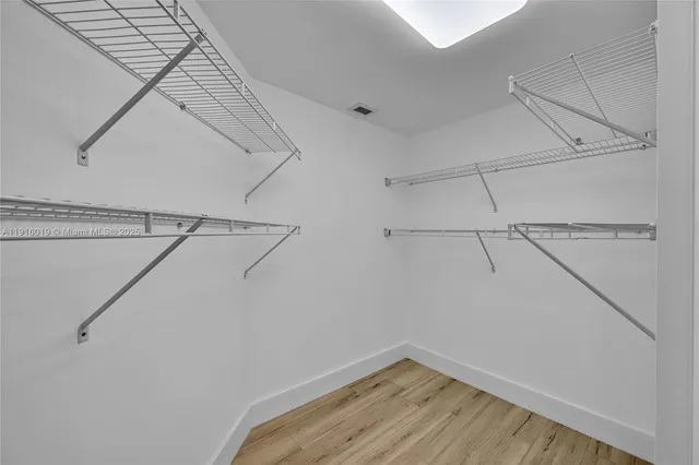 a view of a room with racks on the wall