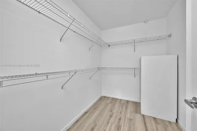 a view of a room with racks on the wall