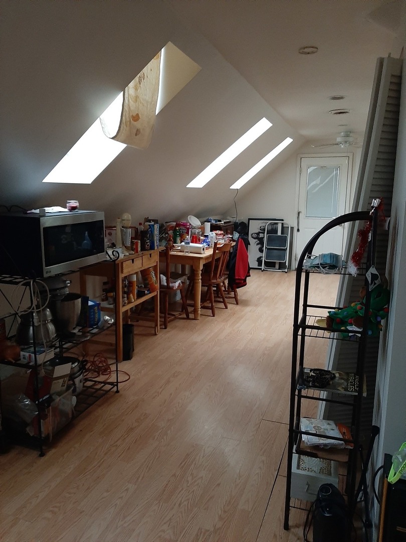 3142 South Morgan Street Chicago, IL 60608 - Photo 16 of 22 a view of a room with gym equipment