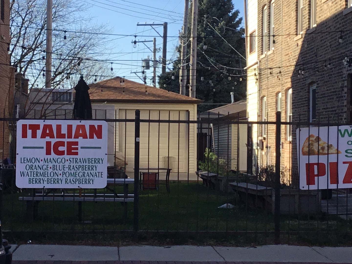 3142 South Morgan Street Chicago, IL 60608 - Photo 21 of 22 a view of a brick house with many windows