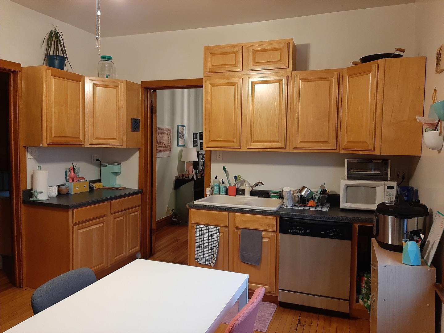 3142 South Morgan Street Chicago, IL 60608 - Photo 7 of 22 a kitchen with stainless steel appliances a refrigerator sink and cabinets