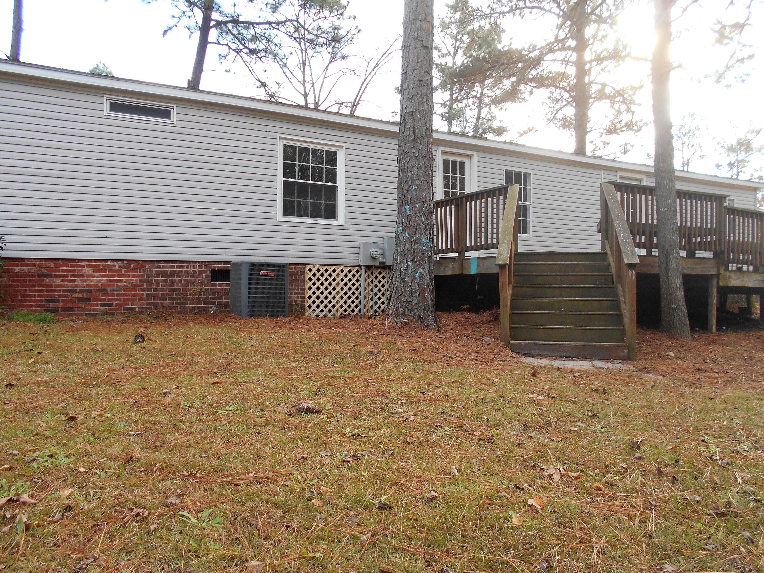 620 McIntosh Road Carthage, NC 28327 - Photo 3 of 51 Easy access to the spacious deck and back yard.