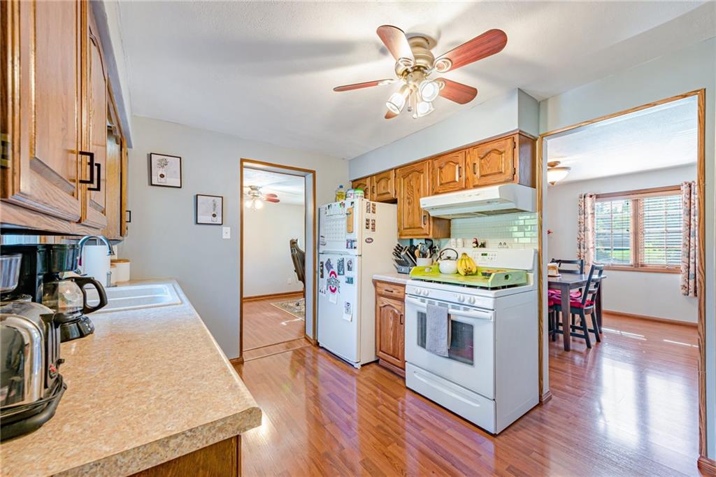 36 Kennedy Lane McKees Rocks, PA 15136 - Photo 10 of 46 a kitchen with a table and chairs in it