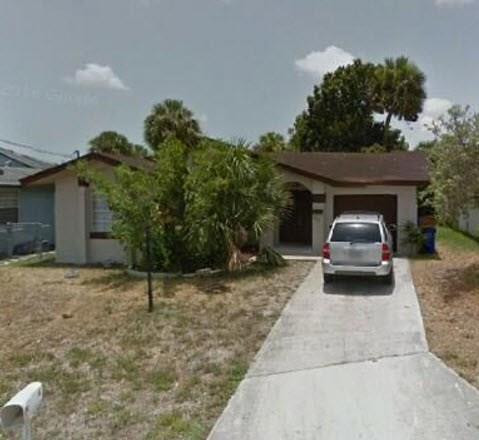2970 Northwest 8th Road Fort Lauderdale, FL 33311 - Photo 1 of 1 a car parked in front of house