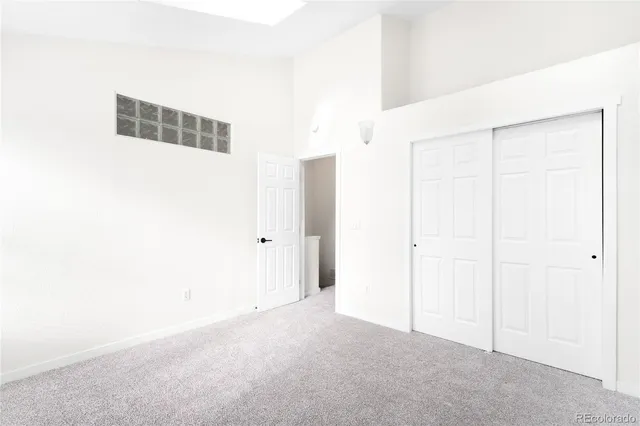 a view of a closet area with entryway