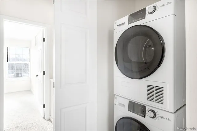a close view of a utility room with washer and dryer